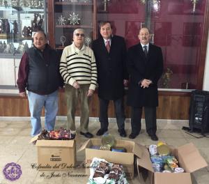 Entrega de café y latas de conserva a la Obra Social de San Juan de Dios